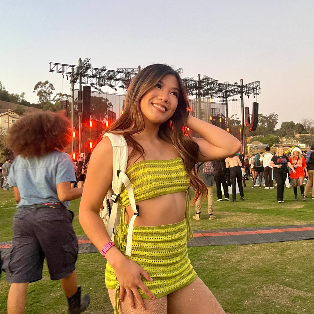 woman with white hydration backpack at rave