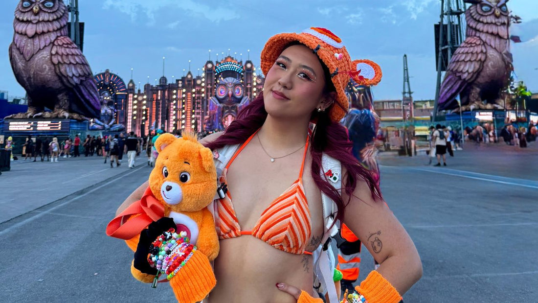 Festival-goer wearing a Hauter rave hydration backpack at an outdoor music festival