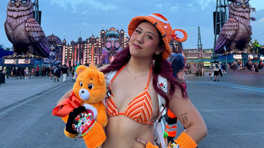 Festival-goer wearing a Hauter rave hydration backpack at an outdoor music festival