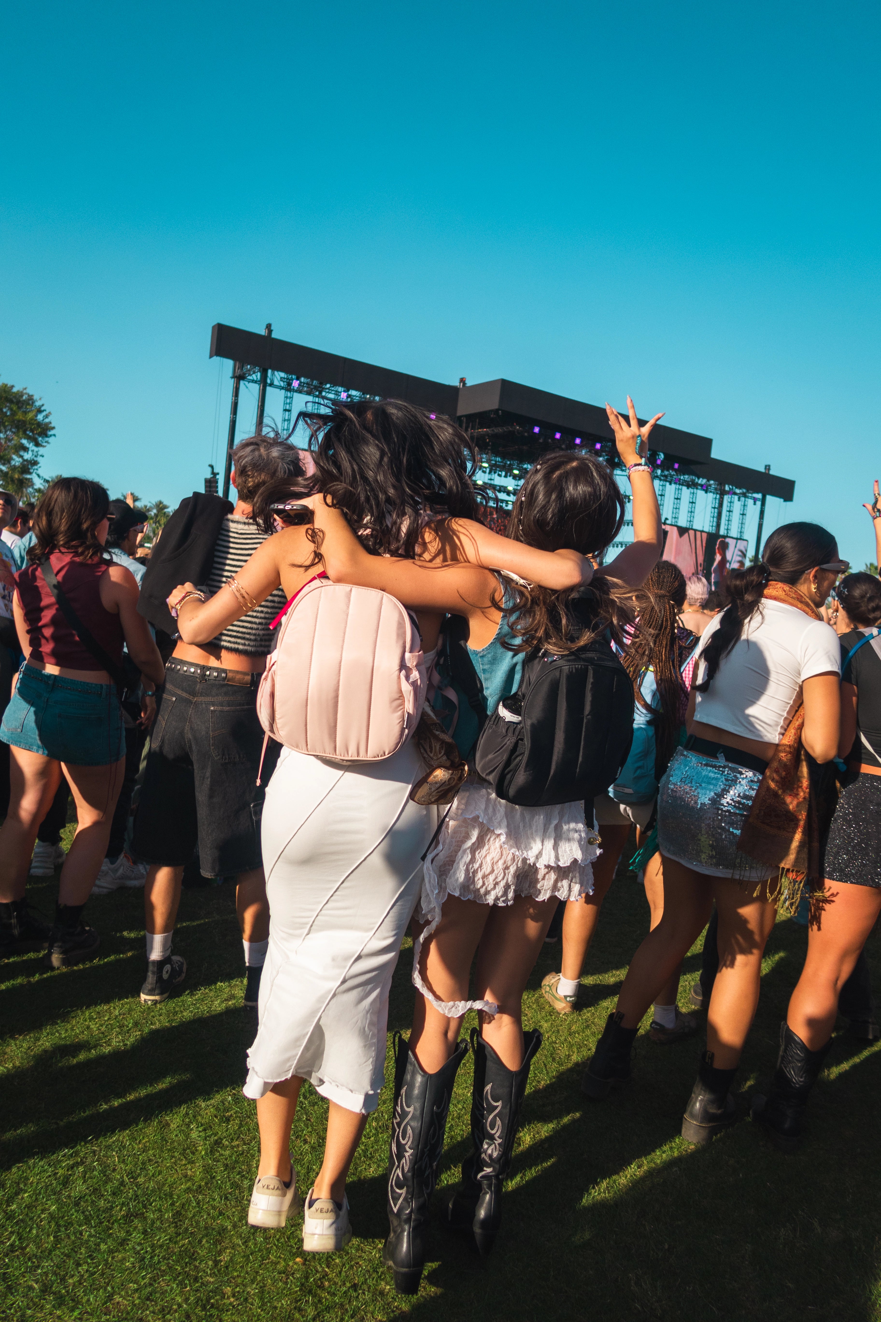 two women dancing at coachella music festival